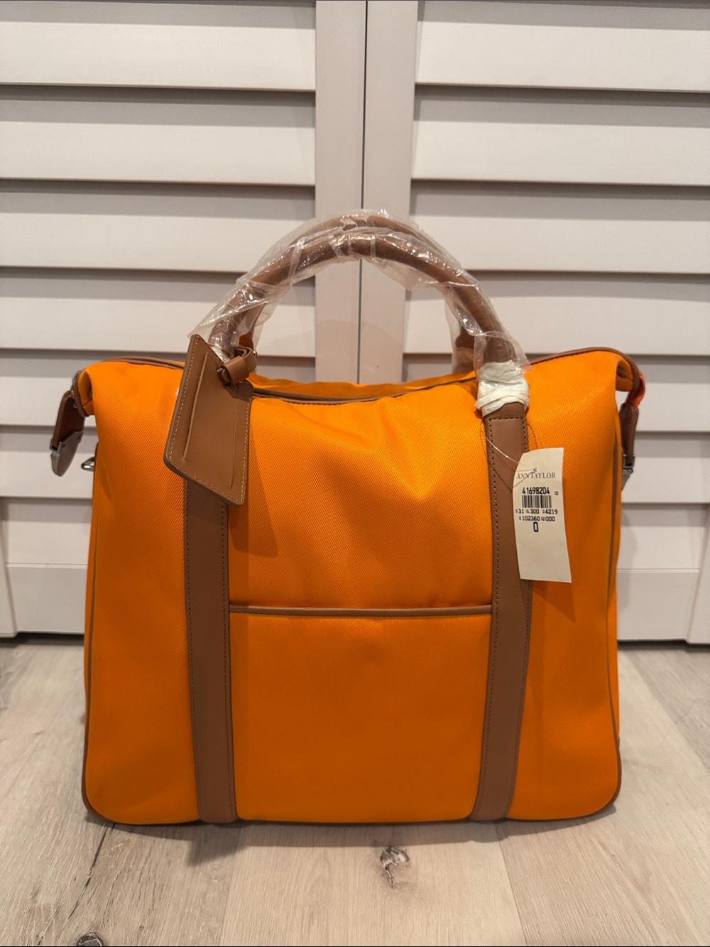 Ann Taylor NWT Canvas Orange Duffel Bag with Tan Trim.